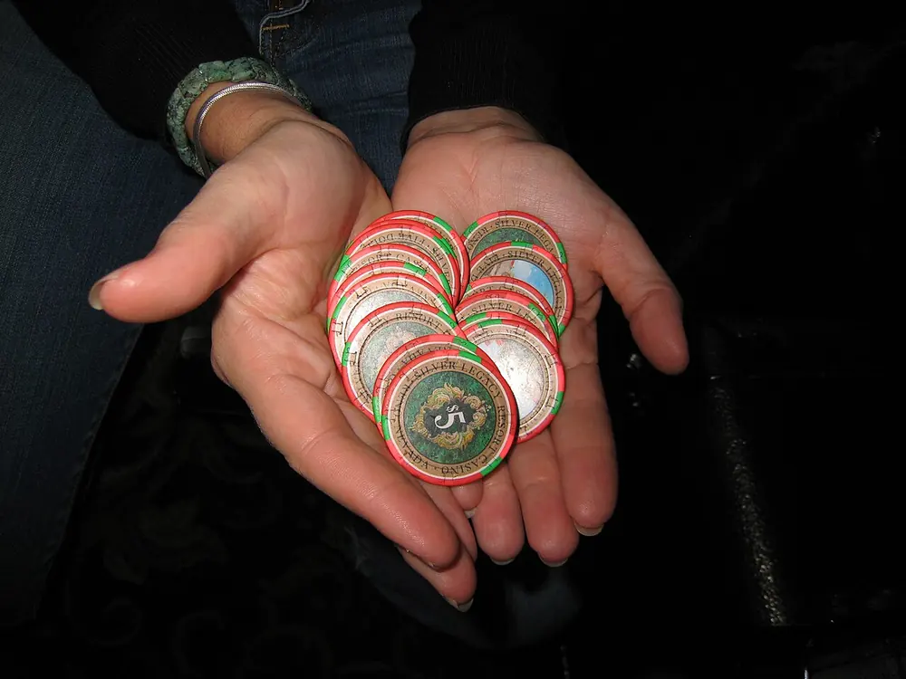 how to deposit crypto casino - casino chips on a table