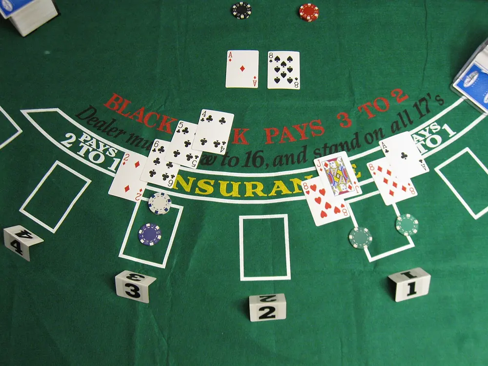 slots of paradise casino - blackjack hand on felt