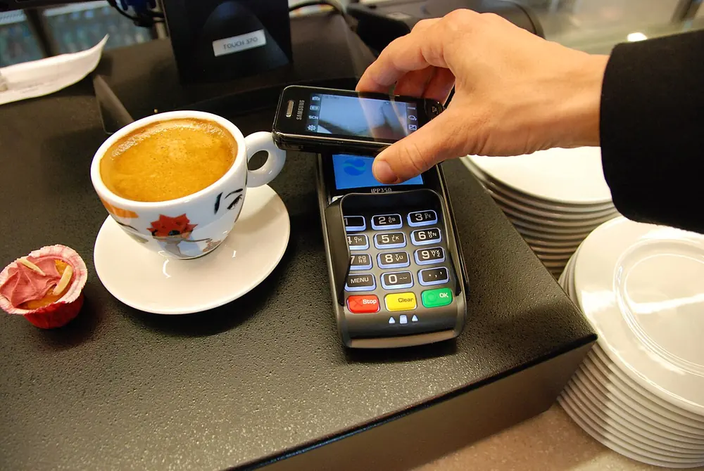 Mobile payment at a terminal - npfl live betting tips nigeria