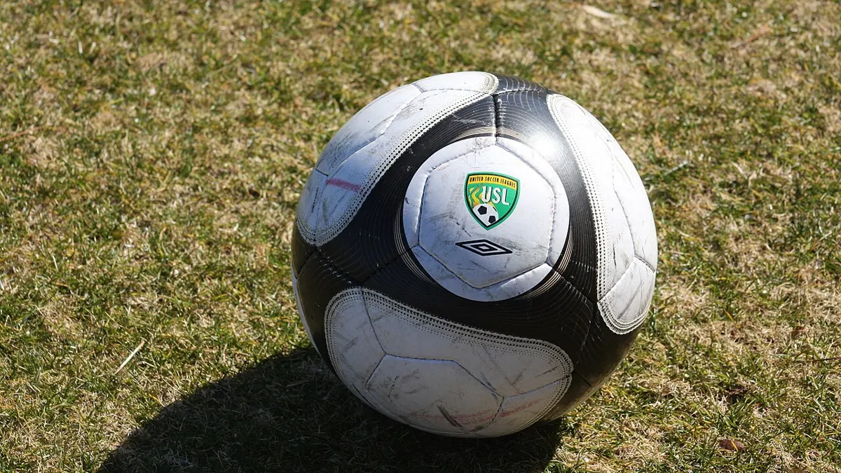 Football on a pitch - betting on crypto price