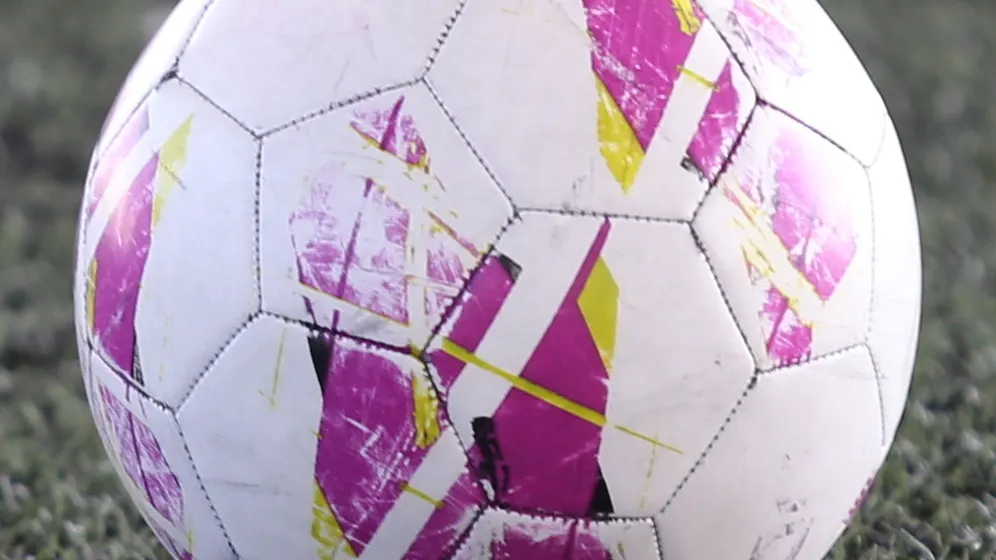 Football on a pitch - betting tax in nigeria