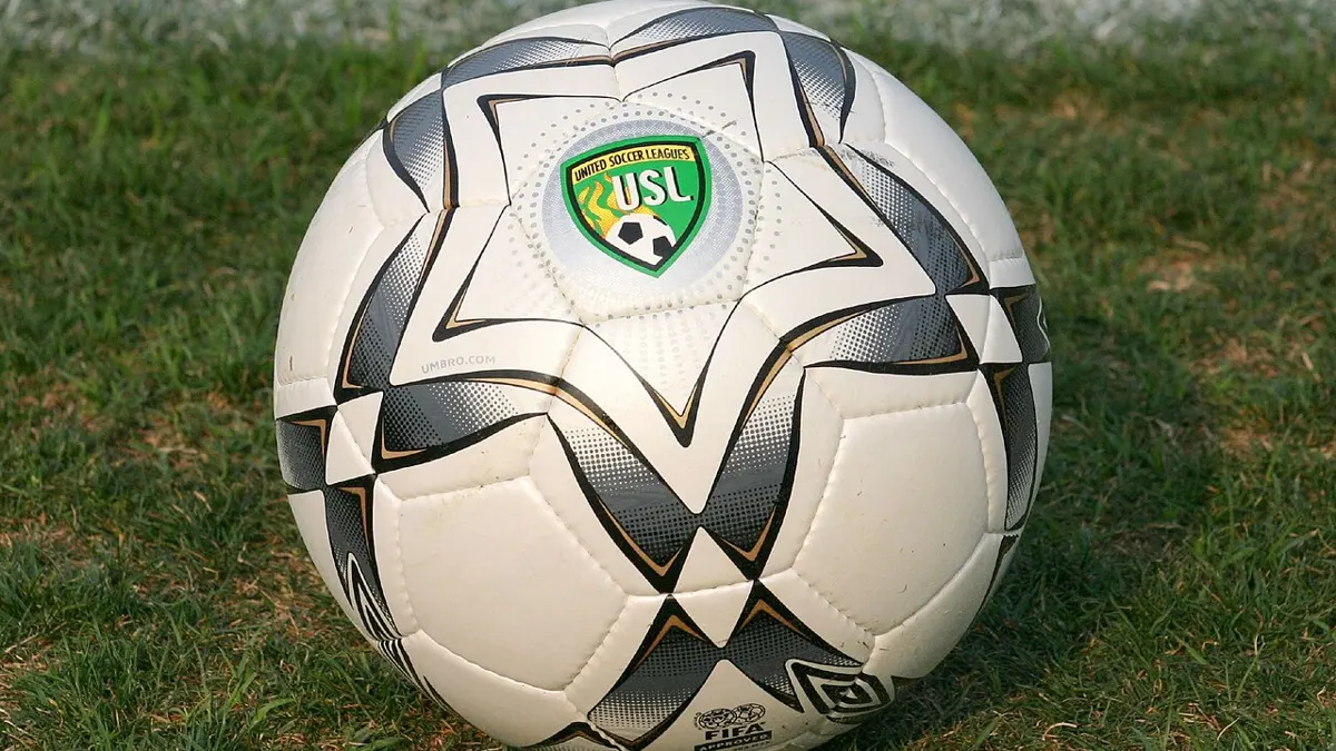 Football on a pitch - betting coupon nigeria